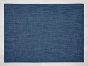 Chilewich | Boucle Rugs - Blueberry features a detailed blue fabric pattern, ideal for adding elegance and functionality to dining or kitchen spaces.