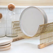 Be Home | Leo Dish Drying Rack in use, holding plates and glassware on a compact stainless steel frame, ideal for small kitchen spaces.