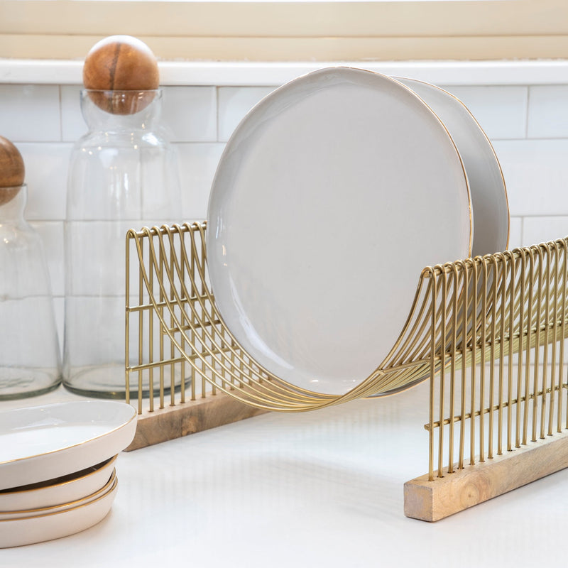 Be Home | Leo Dish Drying Rack in use, holding plates and glassware on a compact stainless steel frame, ideal for small kitchen spaces.