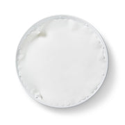 Close-up of the 'Classic White' Original Flat Plate Liners on a white plate, highlighting the product's smooth, oval design from Athens Cooks kitchen store.