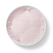 Plate & Pattern 'Pink Me Up' Original Flate Plate Liners displayed on a white plate, showcasing a pink and white striped design.