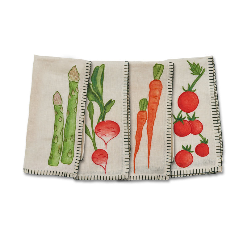 Misette | Still Life Embroidered Linen Napkins in Green featuring vegetable motifs on 100% linen fabric, set of four, displayed folded showcasing intricate embroidery.