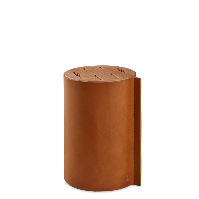 Wüsthof 6-Slot Block, Beech with Leather, showcasing its cylindrical design and precision craftsmanship for organized knife storage.