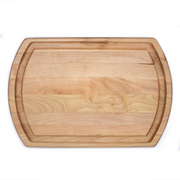 J.K. Adams | Turnabout Reversible Carving Board, 20x14 Cherry, features a side with a poultry cradle and a flat side with a juice groove for versatile carving.