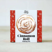 FarmSteady - Cinnamon Roll Making Kit in red-and-white packaging featuring an illustrated cinnamon roll, ideal for homemade cinnamon rolls with provided mixes and baking essentials.