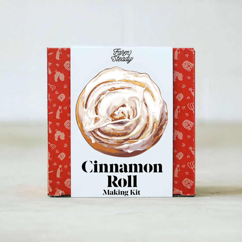 FarmSteady - Cinnamon Roll Making Kit in red-and-white packaging featuring an illustrated cinnamon roll, ideal for homemade cinnamon rolls with provided mixes and baking essentials.