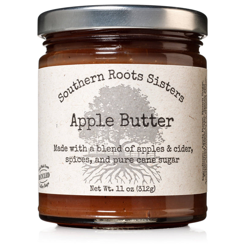 Southern Roots Sisters Apple Butter in an 11 oz glass jar, showcasing rich brown butter made with apples, cider, spices, and pure cane sugar.