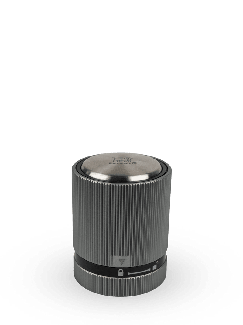 Peugeot BULK DISPLAY Line Bottle Stopper with a carbon finish, featuring a silver cylindrical design and close-up details of the lock, logo, and bar code.