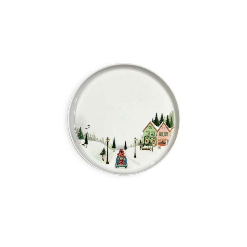 Pillivuyt Winter Decor Toulouse Plate, Set of 4, featuring a charming village scene with snowy lanes, vintage street lamps, and a gift-laden car.