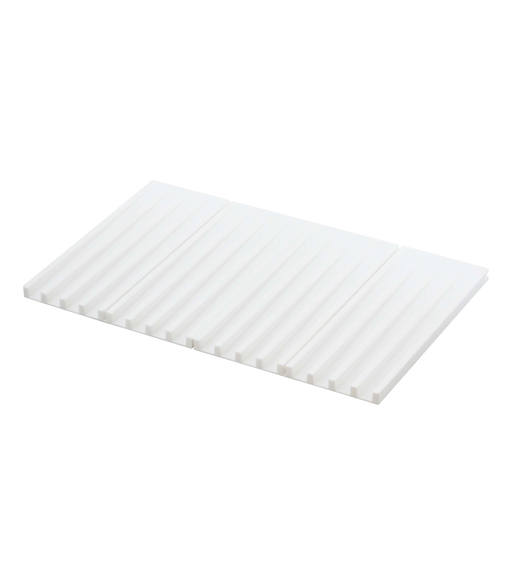 Yamazaki Home - Tower Folding Dish Drainer Mat in white silicone, featuring parallel grooves for efficient drying and foldable design for easy storage.