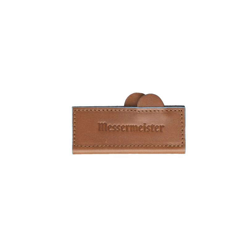 Messermeister Leather Magnetic Edge-Guard - 4: Brown, a stitched leather sheath with embossed Messermeister, designed to protect and store a chef’s knife safely.
