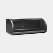 Brabantia USA Inc's Roll Top Bread Box, a sleek black metal container with a shelf, ideal for keeping bread fresh and enhancing kitchen efficiency.