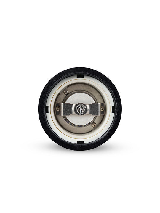 Close-up of Peugeot | Isen Salt Mill's interior, showcasing ceramic insulator disk and metal contacts, highlighting the craftsmanship and functionality of this premium kitchen tool.