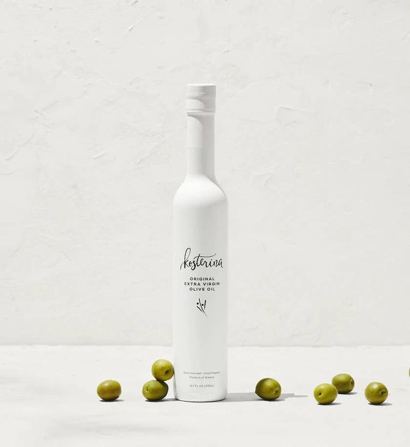 Kosterina - Original Extra Virgin Olive Oil (375ml) bottle alongside green olives, showcasing premium Greek olive oil from early harvest Koroneiki olives.