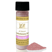 Lux Life Natural Edible Luster Dust: Super Gold, a small bottle of pink shimmer powder with black cap, perfect for enhancing cake decorations.