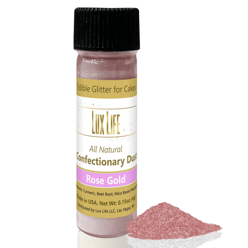 Lux Life Natural Edible Luster Dust: Super Gold, a small bottle of pink shimmer powder with black cap, perfect for enhancing cake decorations.