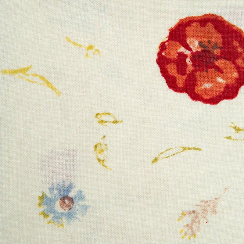 Close-up of Caravan Home's Springfield Multi Napkins, featuring hand-printed poppies and dandelions, perfect for enhancing dining experiences. Set of six, 19 x 19.