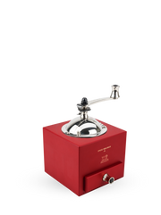 Peugeot | Roellinger Pepper Mill, Red: A vintage-style grinder with a hand-crank, metal dome, and front drawer, embossed with the Peugeot logo, blending modernity and tradition.