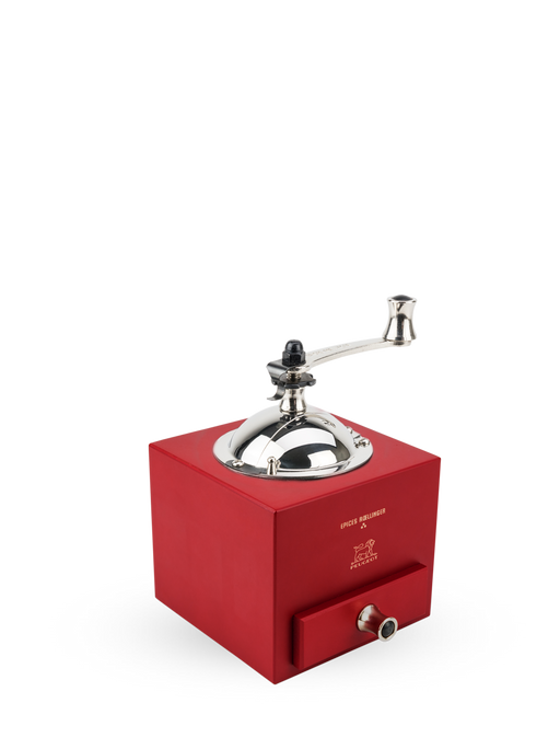 Peugeot | Roellinger Pepper Mill, Red: A vintage-style grinder with a hand-crank, metal dome, and front drawer, embossed with the Peugeot logo, blending modernity and tradition.