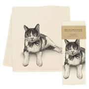 Eric & Christopher - Tuxedo Cat Tea Towel Sundance, featuring a detailed stipple-style tuxedo cat illustration. Includes one unfolded and one folded towel with brand label.