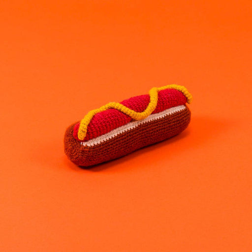 Ware of the Dog - Hand Knit Hot Dog Dog Toy, crafted from 100% lambswool with natural dyes, features a squeaker and supports fair-trade employment in Nepal.