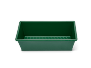 Great Jones | Breadwinner - Raspberry, a green rectangular waste container with a wavy, corrugated bottom, designed for optimal nonstick baking performance.