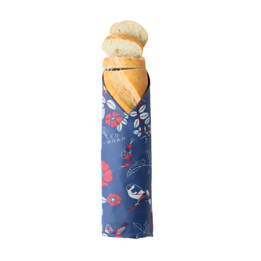 Bee's Wrap - Bread Wrap - Botanical Print: A fresh baguette in a reusable fabric wrap with floral and bird motifs, designed for eco-friendly bread storage.