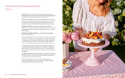 Wishbone Kitchen Cookbook spread featuring an Olive Oil Cake recipe with a summery photo of cake on a pink stand, embodying elegant, unfussy cooking.