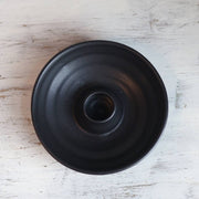 Gravesco Pottery - Palo Santo Burning Ritual Dish: Black, overhead view of a handcrafted, wheel-thrown stoneware dish with a central holder, designed for mindful incense burning.