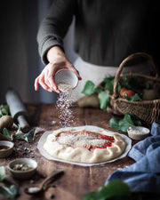 Farmhouse Pottery - Silo Ramekin: Single used for sprinkling ingredients on a rustic fruit galette, surrounded by baking tools and ingredients on a wooden board.