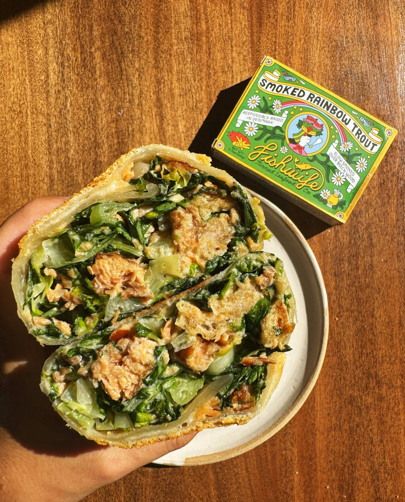 Smoked Rainbow Trout wrap with greens, showcasing Fishwife's improved trout tin, ideal for culinary enthusiasts at Athens Cooks.