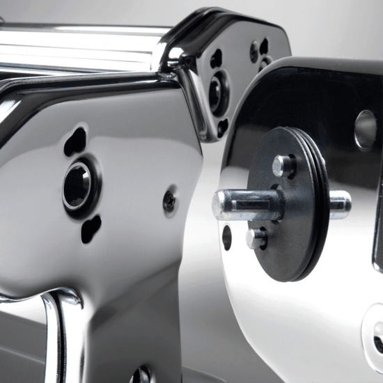 Marcato | PastaDrive Motor 110V Premium, featuring a chrome-plated manual roller and crank shaft, enhances homemade pasta preparation with robust stability and quick coupling capabilities.