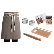 Marcato | Gnocchi Like A Pro Kit includes apron, cutters, rolling pin, cutting board, measuring stick, and recipe booklet, perfect for homemade gnocchi preparation.