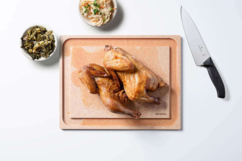 Epicurean | Small BBQ Board displayed with cooked chicken, coleslaw, and knife, highlighting its spacious design and liquid-catching groove, perfect for BBQs.