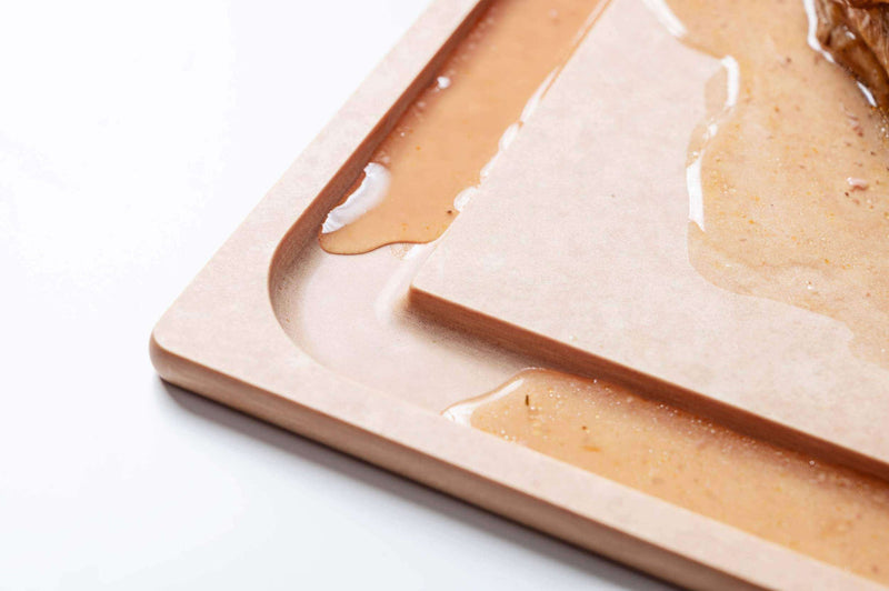 Epicurean | Small BBQ Board featuring a rectangular design with a groove to capture liquids, ideal for transferring grilled food from BBQ to table.