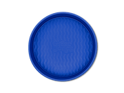 Great Jones | Patty Cake - Broccoli, a round baking container with a wavy, corrugated bottom, designed for nonstick, kid-friendly baking.