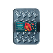 Nordic Ware | 2 Piece Puppy Love Treat Pan and Dog Treat Mix featuring bone-shaped molds for homemade dog treats.