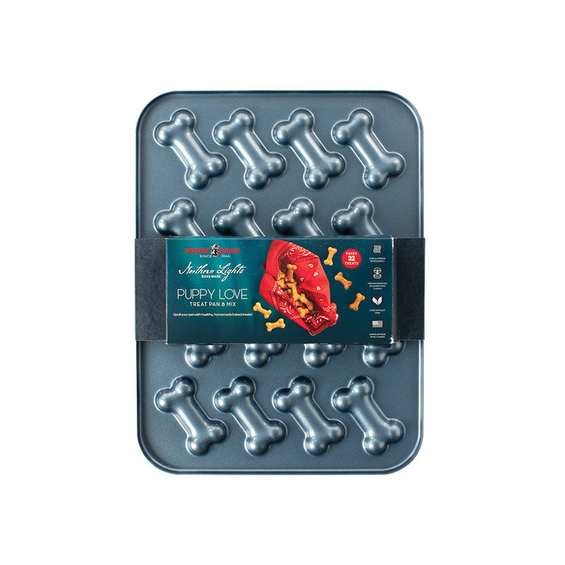 Nordic Ware | 2 Piece Puppy Love Treat Pan and Dog Treat Mix featuring bone-shaped molds for homemade dog treats.