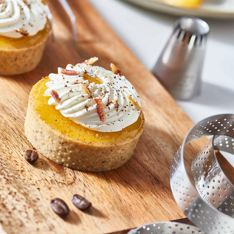de Buyer | Perforated Tart Ring - 4 made of stainless steel, ideal for baking crisp, golden tarts with perfect heat distribution and steam release.