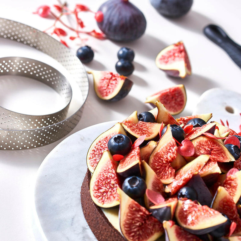 de Buyer | Perforated Tart Ring - 4 made from stainless steel, designed for even baking and crispy tart crusts with perfect heat distribution and steam release.