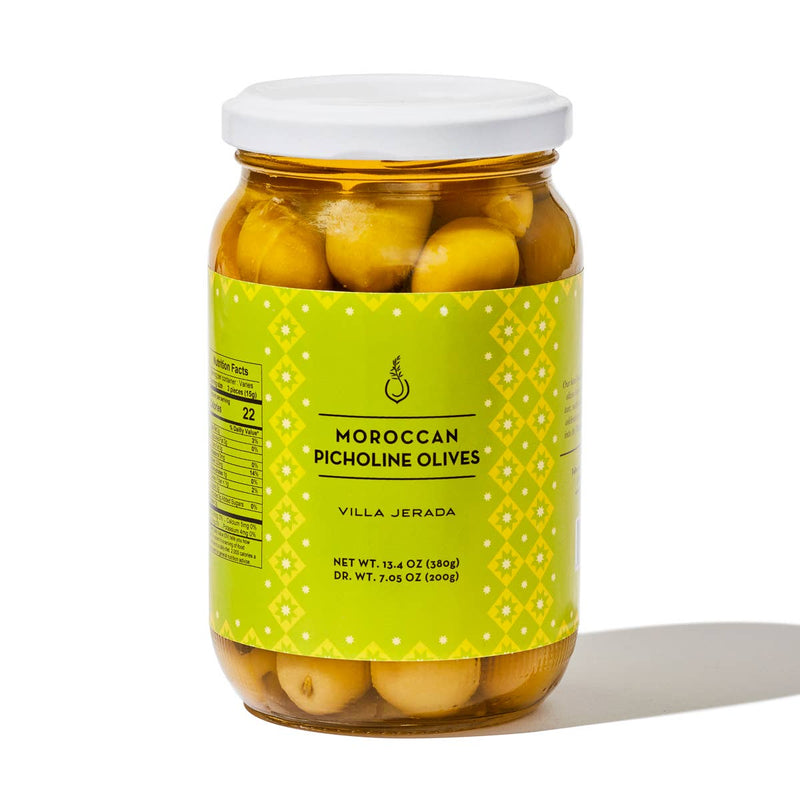 Villa Jerada - Picholine Olives - 7oz jar showcasing handpicked Moroccan olives with a crisp, nutty flavor, ideal for enhancing salads or traditional dishes.