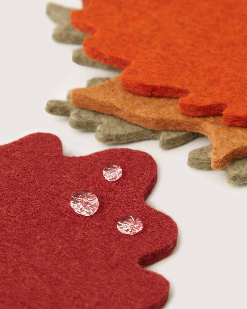 Graf Lantz - Merino Wool Autumn Leaf Coaster Multi 4 Pack, showcasing water-resistant, felt leaf coasters for protecting surfaces with seasonal charm.