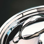 Hestan Provisions | Stainless Steel Lids - Dome - 14, featuring a polished handle with decorative engraving, designed for optimal cooking performance and snug fit.