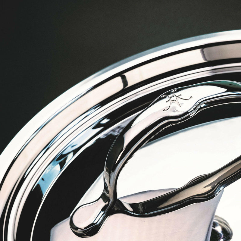 Hestan Provisions | Stainless Steel Lids - Dome - 14, featuring a polished handle with decorative engraving, designed for optimal cooking performance and snug fit.