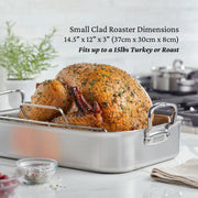 Hestan Provisions Classic Roaster with Rack, 14.5 inches, featuring a golden-brown turkey, stainless-steel construction, and ergonomic handles, ideal for versatile cooking.