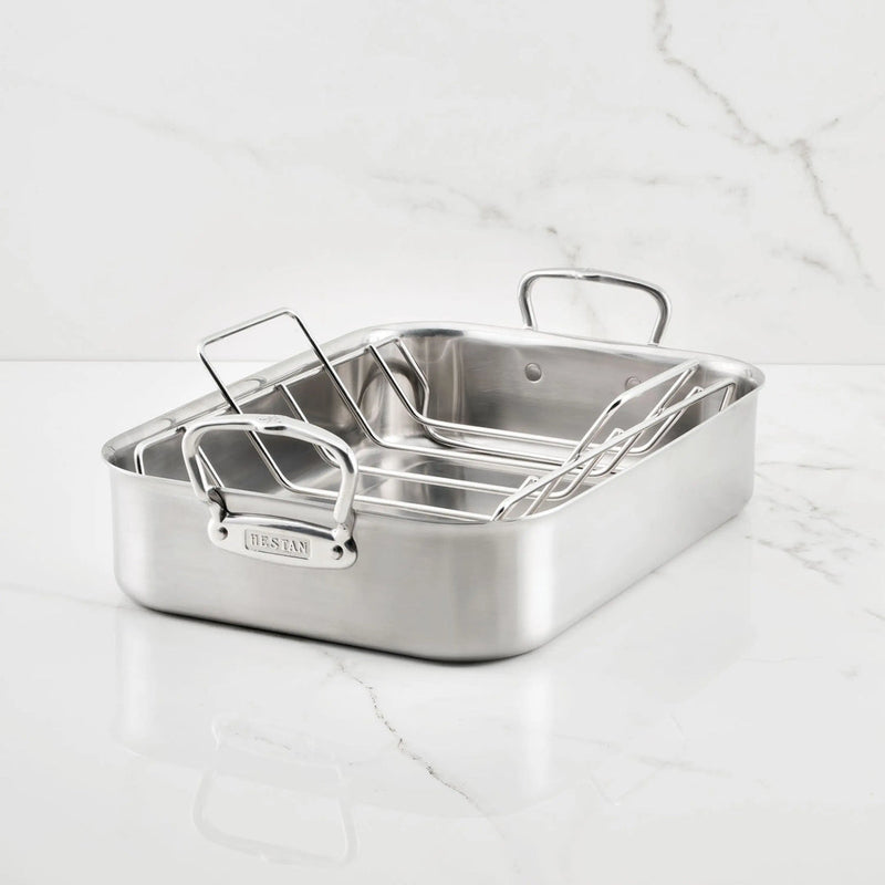 Hestan Provisions | Classic Roaster with Rack, 14.5 Inches, on a countertop, featuring durable stainless steel construction and ergonomic handles for efficient kitchen use.