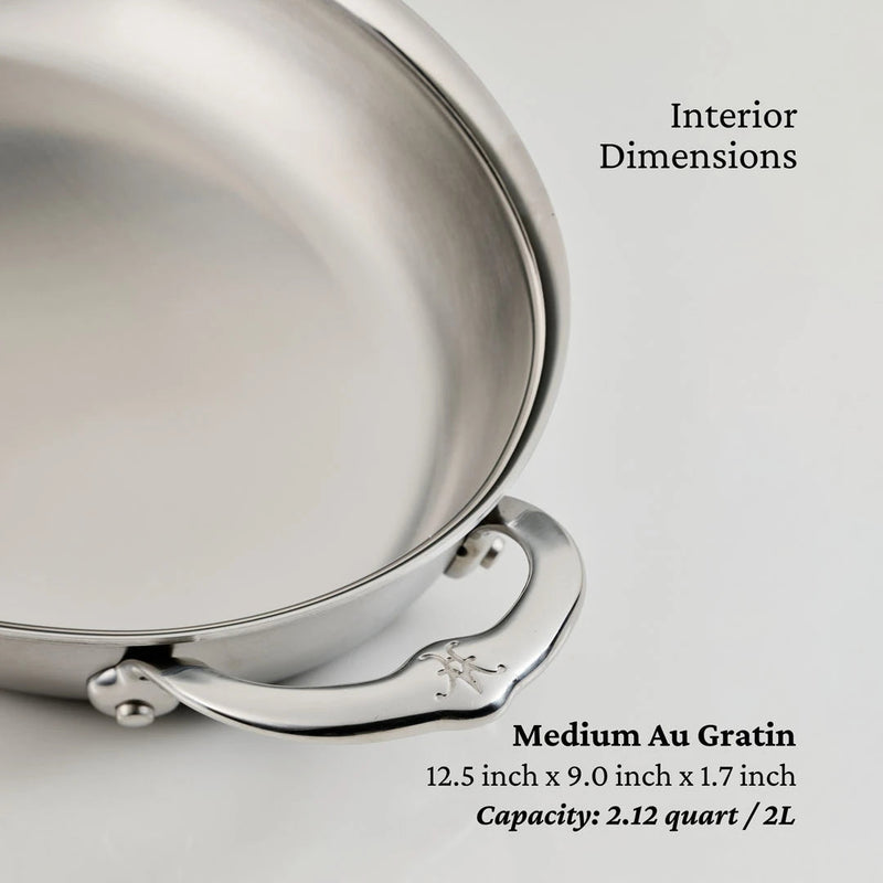 Hestan Provisions Medium Clad Oval Au Gratin, 12.5x9, stainless steel with decorative handle, 2.12 quarts, designed for even heat distribution and sophisticated kitchen-to-table presentation.