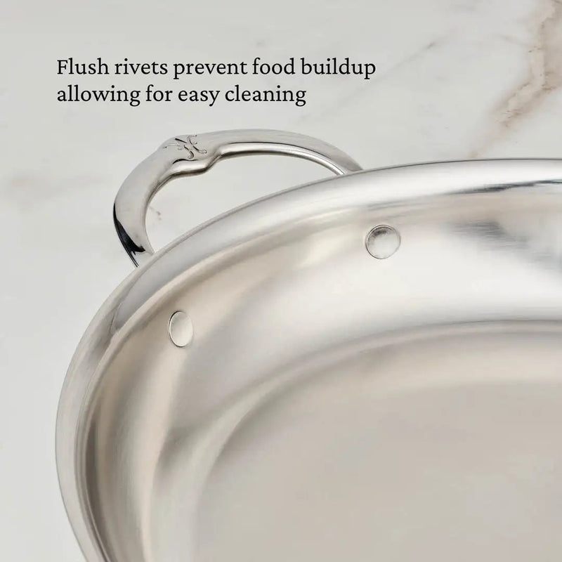 Hestan Provisions | Large Clad Oval Roaster close-up showing flush rivets on stainless steel, emphasizing easy cleaning and refined craftsmanship for chefs and home cooks.