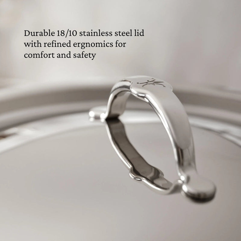 Hestan Provisions | Stainless Steel Lid Large, 12.5. Close-up of ergonomic handle on durable 18/10 stainless steel lid, designed for optimal cooking performance and snug fit.