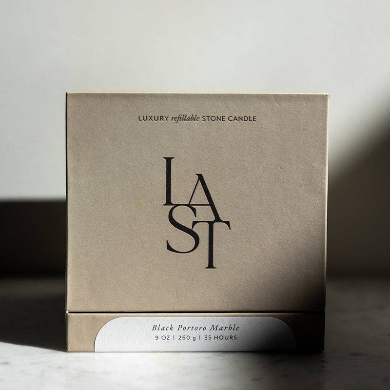 Last Candle Co - Portoro Marble Refillable Candle in elegant box, showcasing luxury stone craftsmanship with gold veining, offering 55 hours burn time, ideal for upscale kitchen ambiance.